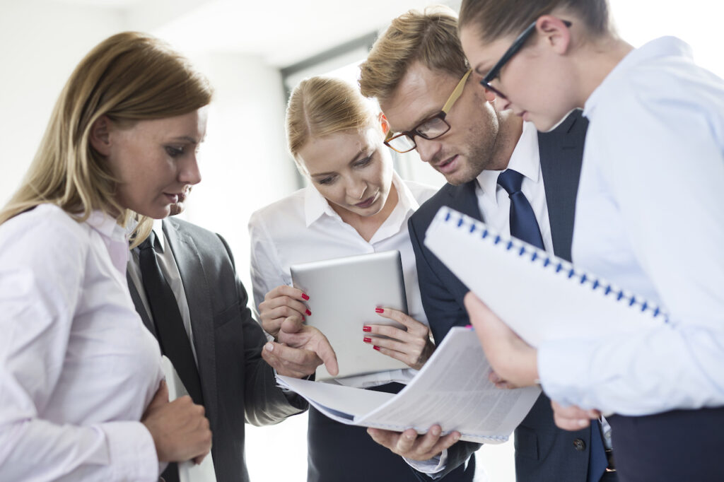 business people discussing a managed IT service provider