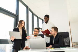 employees discussing cybersecurity awareness training