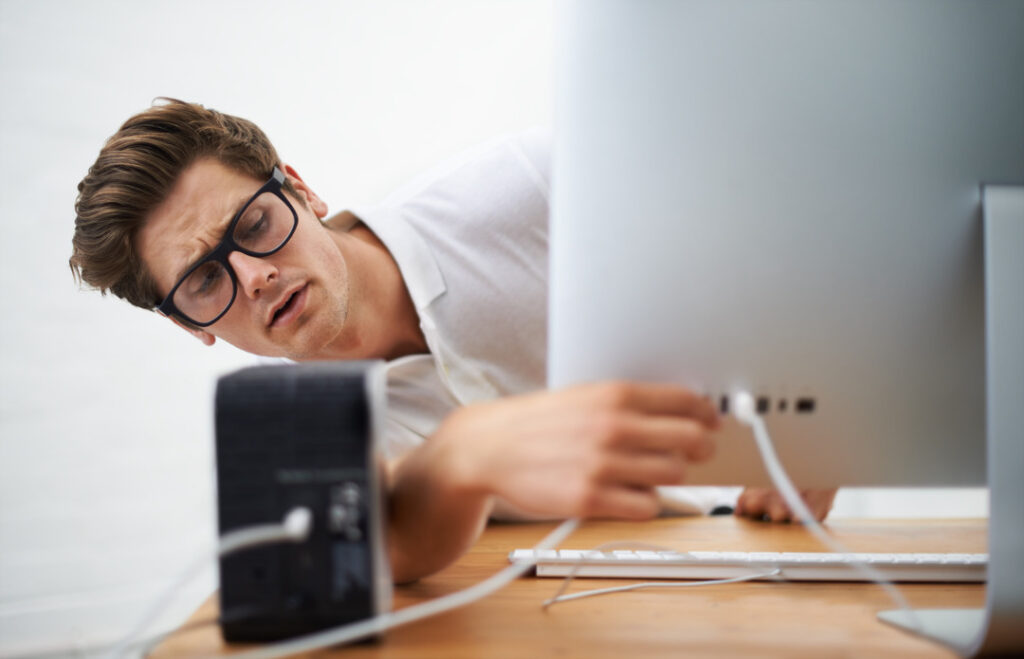 Man fixes his computer